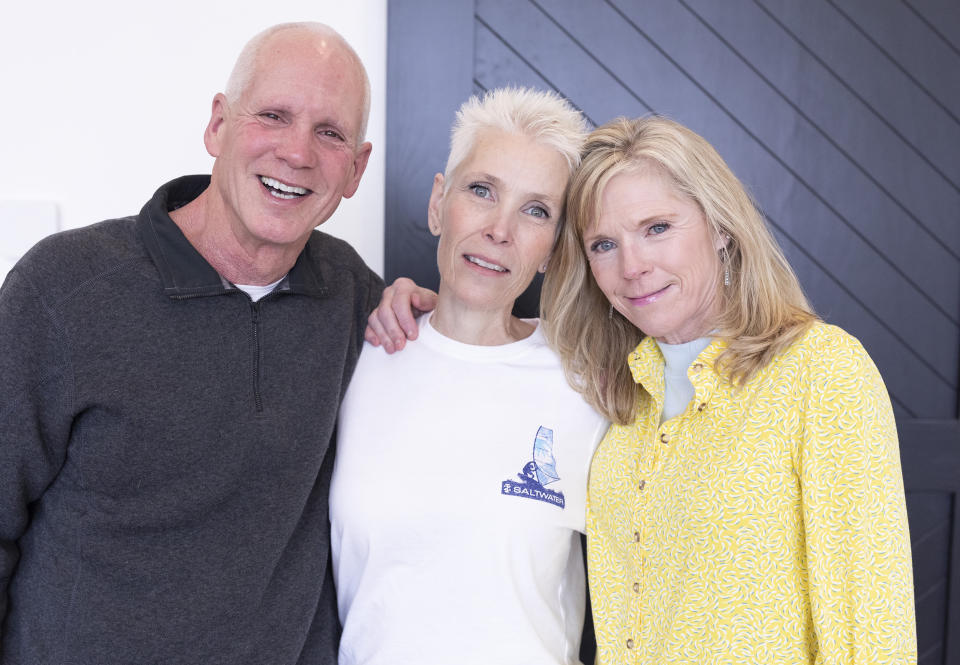 Angie Howard (center) with her daughter Rachel Ruiz's adoptive parents, Brent and Marianne Haslam. (Courtesy Rachel Ruiz)