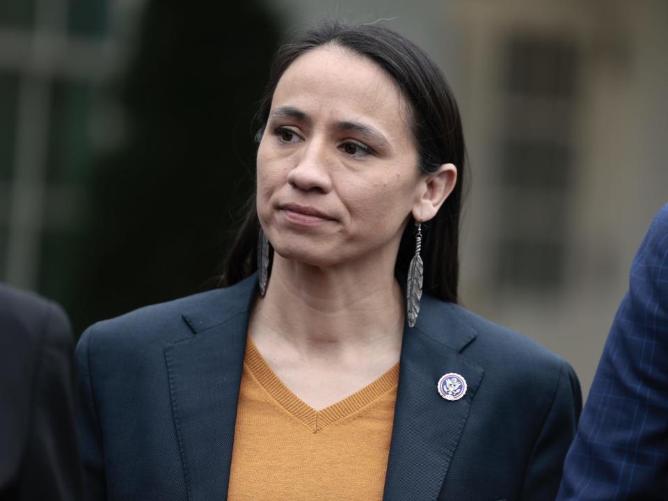 Rep. Sharice Davids (D-KS) listens as Rep. Suzan DelBene (D-WA), the chairwoman of the New Democrat Coalition, speaks to reporters outside of the West Wing of the White House on March 30, 2022 in Washington, DC.