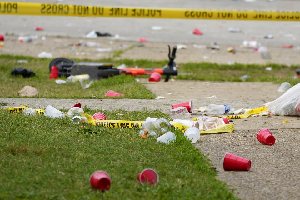 FILE - Party debris is seen in the area of a mass shooting incident in the Southern District of Baltimore, Sunday, July 2, 2023. Baltimore leaders are condemning what they called a “catastrophic breakdown” in how city police responded to 911 calls leading up to a mass shooting at a neighborhood block party earlier this month. Police received a call about hundreds of partygoers armed with guns and knives about three hours before the shooting, but on-duty officers decided no law enforcement services were required.(AP Photo/Julio Cortez, File)