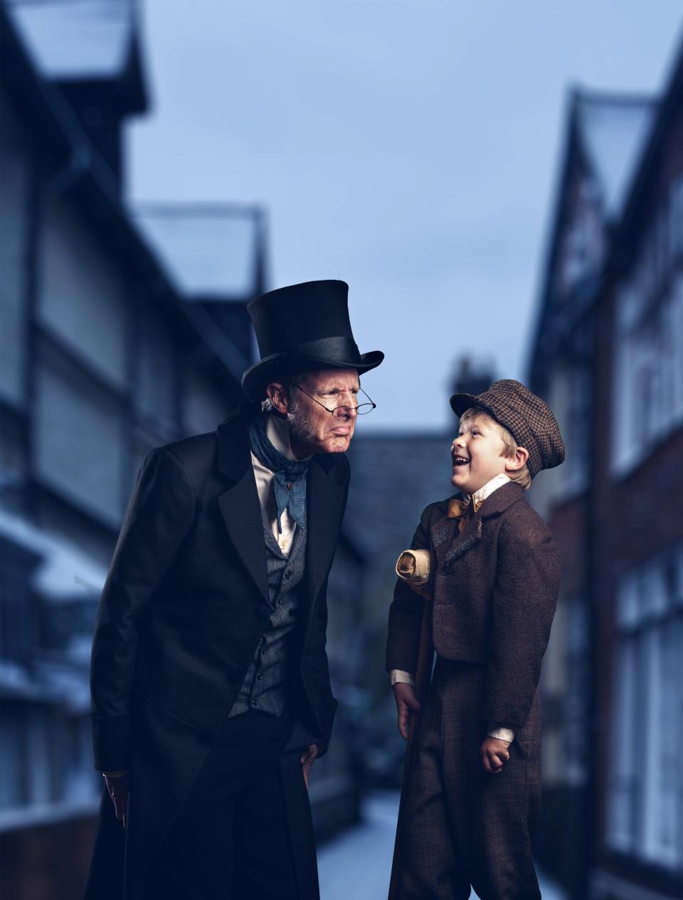 Paul Slade Smith as Ebenezer Scrooge and Sam Mason as Tiny Tim in ASF's production of "A Christmas Carol."