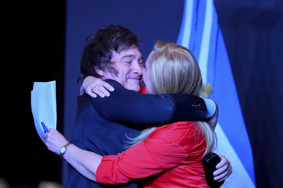 Javier Milei, presidential candidate of the Liberty Advances coalition, embraces his sister Karina Milei after being elected president in a runoff election in Buenos Aires, Argentina, Sunday, Nov. 19, 2023. (AP Photo/Natacha Pisarenko)