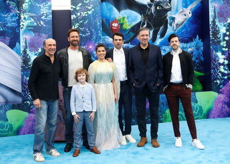 Cast members F. Murray Abraham, Gerard Butler, AJ Kane, America Ferrera, Jay Baruchel, Craig Ferguson and Christopher Mintz-Plasse pose during the premiere of "How to Train Your Dragon: The Hidden World" in Los Angeles, U.S., February 9, 2019. REUTERS/Mario Anzuoni