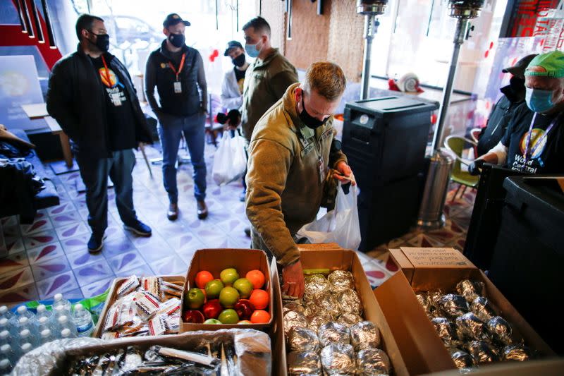 Military personnel receives food donated by World Central Kitchen ahead of U.S. President-elect Joe Biden's inauguration, in Washington