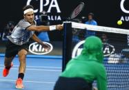 Tennis - Australian Open - Melbourne Park, Melbourne, Australia - 24/1/17 Switzerland's Roger Federer hits a shot during his Men's singles quarter-final match against Germany's Mischa Zverev. REUTERS/Thomas Peter