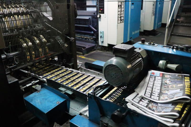 Copies of Apple Daily newspaper are seen at its printing facility in Hong Kong