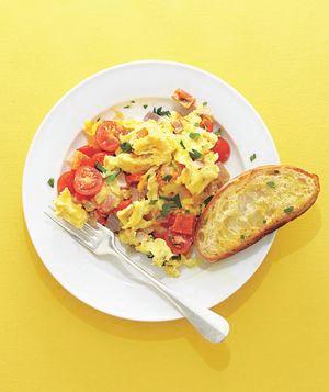Sang An Bulk up scrambled eggs with colorful, healthy additions—cherry tomatoes, bell peppers, onions, parsley—along with Cheddar cheese for extra protein. <a href="https://www.realsimple.com/food-recipes/browse-all-recipes/loaded-scrambled-eggs" data-component="link" data-source="inlineLink" data-type="internalLink" data-ordinal="1">Get the recipe</a>.
