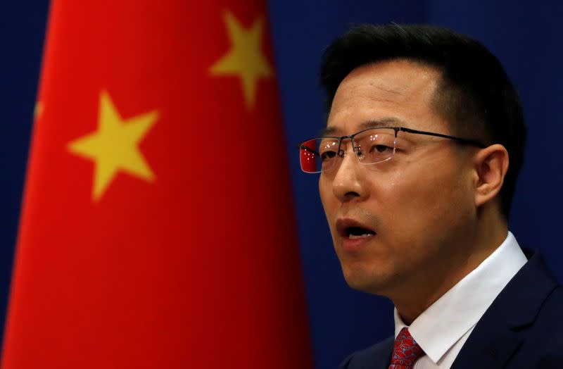 Chinese Foreign Ministry spokesman Zhao Lijian attends a news conference in Beijing