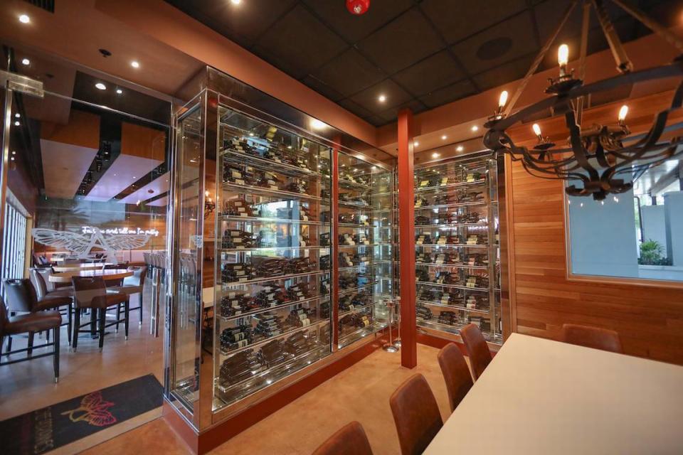 The glassed-in wine cellar at the new Chef Adrianne’s in the Town & Country mall
