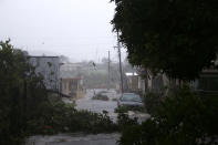 <p>A street is flooded during the passing of Hurricane Irma on Sept. 6, 2017 in Fajardo, Puerto Rico. (Photo: Jose Jimenez/Getty Images) </p>