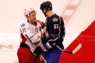 OTTAWA, ON - JANUARY 29: Zdeno Chara #33 of the Boston Bruins and Team Chara talks with Daniel Alfredsson #11 of the Ottawa Senators and Team Alfredsson after defeating Team Alfredsson in the 2012 Tim Hortons NHL All-Star Game at Scotiabank Place on January 29, 2012 in Ottawa, Ontario, Canada. Team Chara defeated Team Alfredsson 12-9. (Photo by Gregory Shamus/Getty Images)