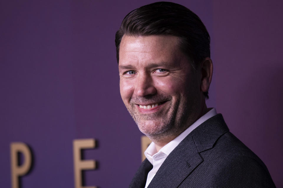 Director Benjamin Caron poses for photographers upon arrival for the World premiere of 'Sharper' in London, Tuesday, Feb. 7, 2022. (Photo by Vianney Le Caer/Invision/AP)