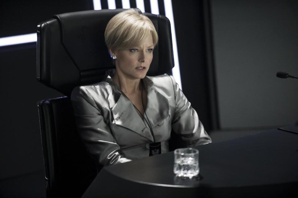 This publicity photo released by Columbia TriStar Marketing Group, shows Jodie Foster as Secretary Delacourt in the CCB HQ Briefing Room being demoted in a scene from the film, "Elysium." (AP Photo/Columbia TriStar Marketing Group, Kimberley French)