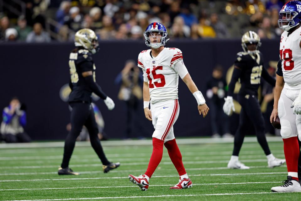 New York Giants quarterback Tommy DeVito (15) walls off the field during an NFL football game against the New Orleans Saints, Sunday, Dec. 17, 2023, in New Orleans. (AP Photo/Tyler Kaufman)