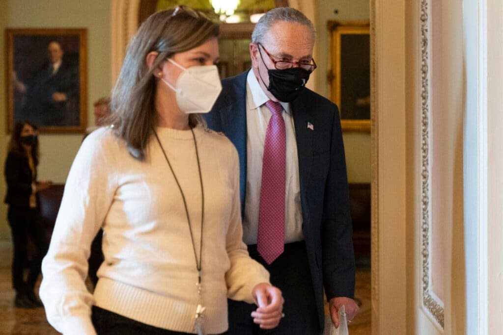 Senate Majority Leader Chuck Schumer of N.Y., walks to a luncheon of Senate Democrats, Thursday, Dec. 2, 2021, on Capitol Hill in Washington. (AP Photo/Jacquelyn Martin)