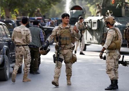 Afghan security forces leave the site of an attack on the Iraqi embassy in Kabul, Afghanistan July 31, 2017.REUTERS/Mohammad Ismail