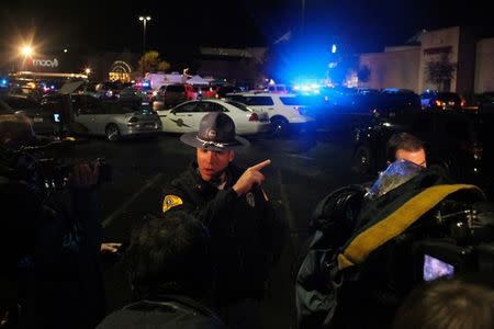 Washington State Trooper Mark Francis speaks to the media at the Cascade Mall following reports of an active shooter in Burlington, Washington, U.S. September 23, 2016. REUTERS/Matt Mills McKnight