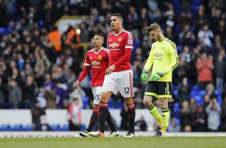 Football Soccer - Tottenham Hotspur v Manchester United - Barclays Premier League - White Hart Lane - 10/4/16 Manchester United's Jesse Lingard, Chris Smalling and David De Gea look dejected at the end of the match Reuters / Eddie Keogh Livepic