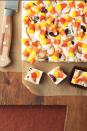 <p>This candy corn fudge recipe also contains salty pretzels and delicious cream cheese.</p><p>Get the <strong><a href="https://www.womansday.com/food-recipes/food-drinks/recipes/a11819/candy-corn-fudge-recipe-123647/" rel="nofollow noopener" target="_blank" data-ylk="slk:Candy Corn Fudge recipe" class="link ">Candy Corn Fudge recipe</a></strong>.</p>