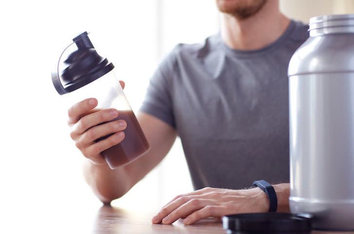 Man holding protein shake