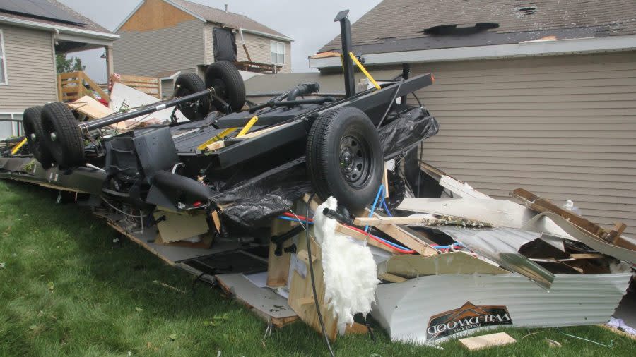 This 30-foot camper was tossed 50 feet behind a home in Comstock Park as a tornado swept through. (Aug. 25, 2023)