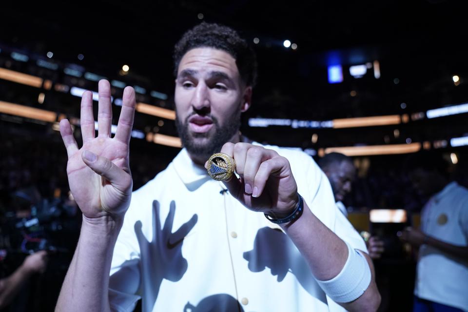 Golden State Warriors guard Klay Thompson receives his championship ring before the game against the Los Angeles Lakers.