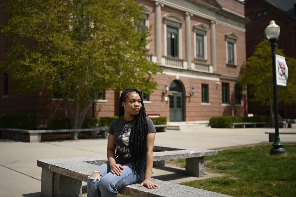 Ashnaelle Bijoux poses on campus, Saturday, April 27, 2024, at Norwich Free Academy in Norwich, Conn. Bijoux, a senior at NFA, has been unable to complete the FAFSA form due to a glitch with the form. (AP Photo/Jessica Hill)