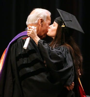 Ashey Biden gives her dad, Vice President Joe Biden, a kiss after receiving her master's degree at the University of Pennsylvania's School of Social Policy and Practice in May 2010. (Photo: Charles Fox/AP)