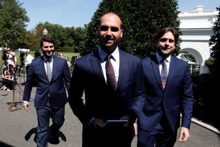 The son of Brazilian President Jair Bolsonaro, Eduardo Bolsonaro, leaves after a meeting with U.S. President Donald Trump at the White House in Washington