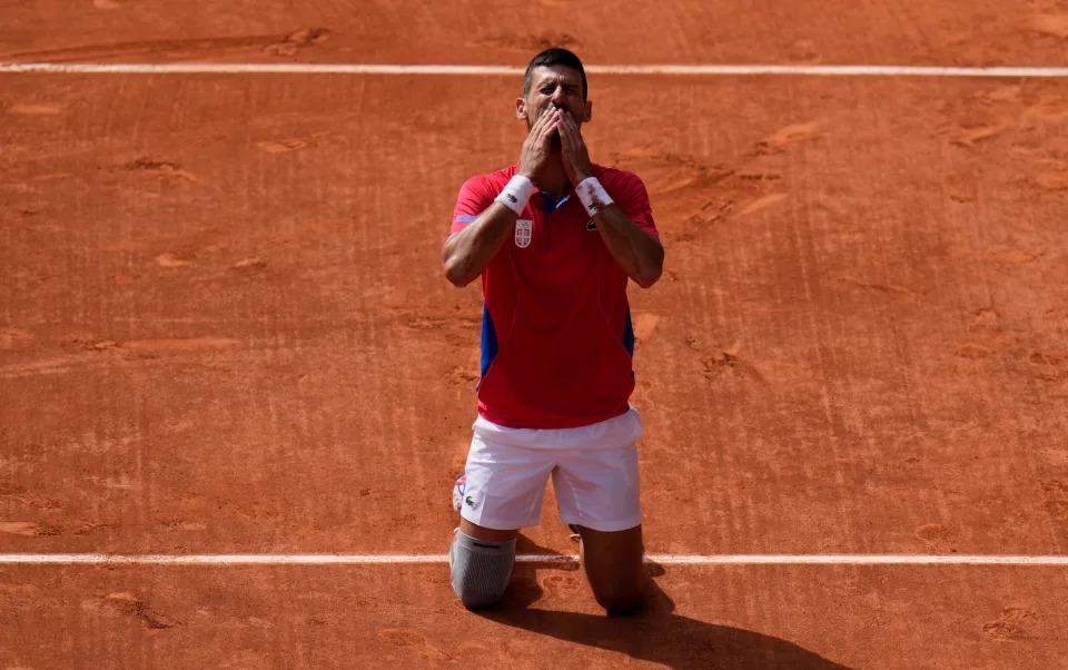 Djokovic celebrates winning the men's singles gold tennis at the Olympics