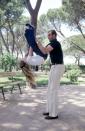 <p>In early 1970, the future King Juan Carlos was photographed playing with his daughter in a Madrid park.</p>