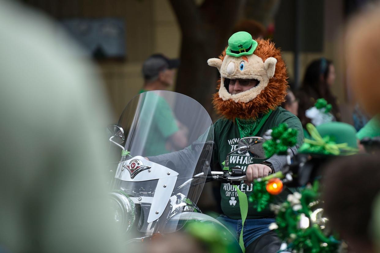 FILE - Motorcyclists ride in the 45th annual St. Patrick's Day parade through downtown Augusta on Friday, March 17, 2023. The parade returns on Saturday at 2 p.m.