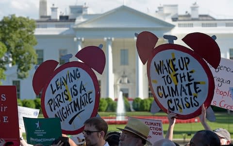 climate protest at the White House - Credit: Susan Walsh/AP