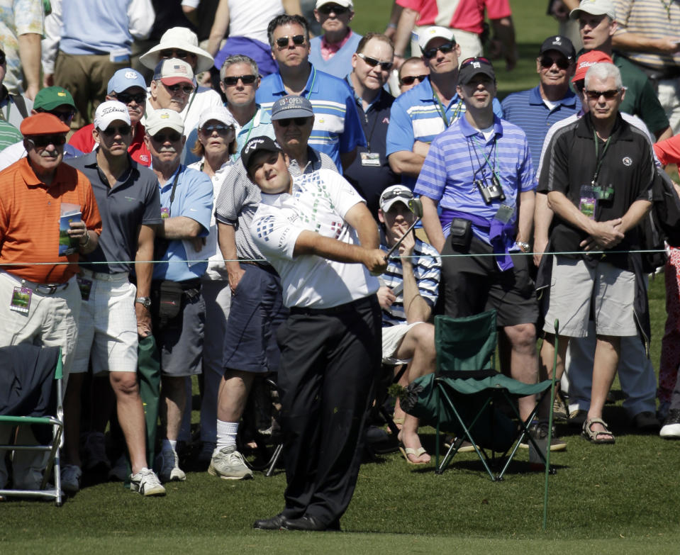 Patrick Reed watches his shot to the second green during the first round of the Masters golf tournament Thursday, April 10, 2014, in Augusta, Ga. (AP Photo/Chris Carlson)