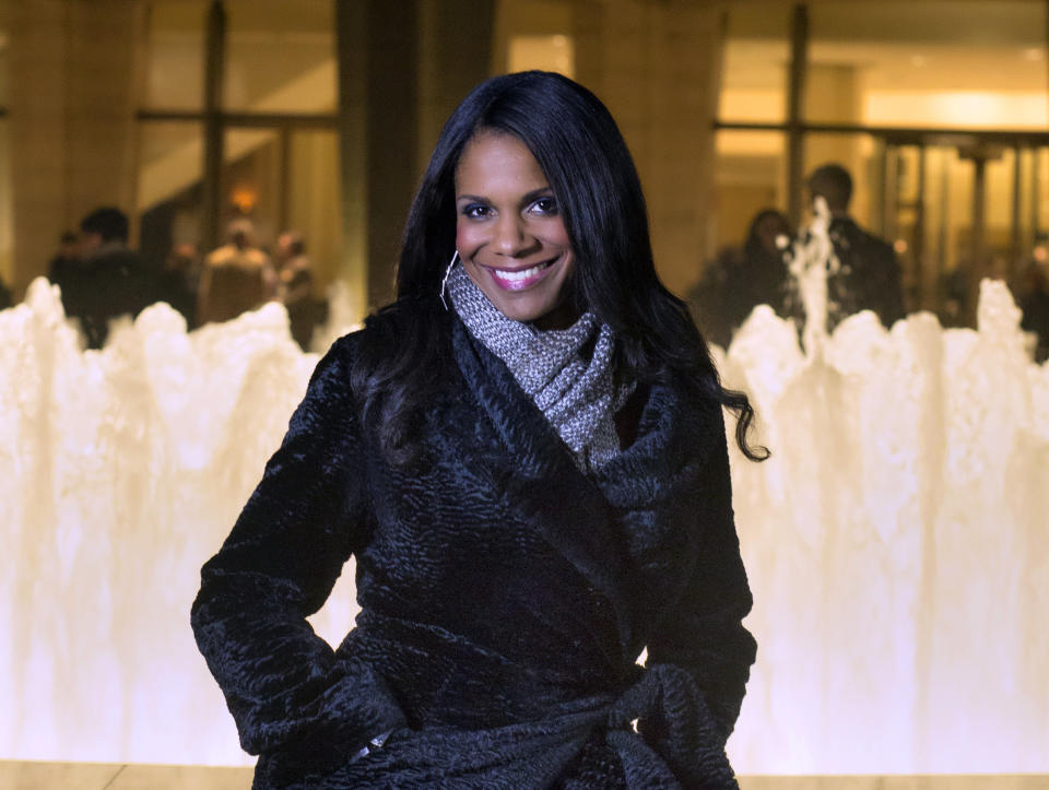 In this photo provided by "Live from Lincoln Center," Broadway star Audra McDonald poses for a portrait in front of the Lincoln Center in New York. PBS said Tuesday, Nov. 27, 2012, that the singer-actress is the new host of "Live from Lincoln Center." McDonald will emcee seven broadcasts from December through spring 2013, starting Dec. 13 with "The Richard Tucker Opera Gala." (AP Photo/"Live from Lincoln Center," Chase Newhart)