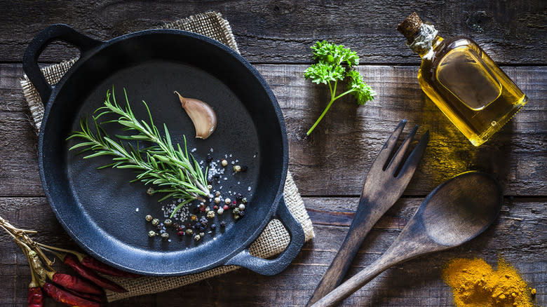 Cast iron skillet with herbs