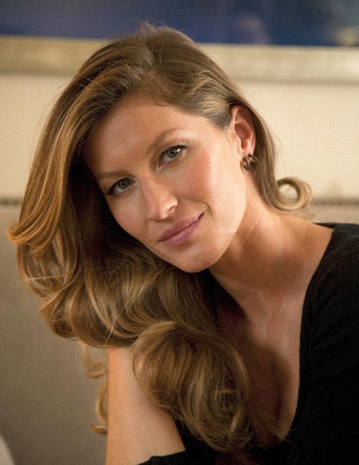 This Jan. 6, 2014 photo shows Fashion model Gisele Bundchen posing for a portrait in New York. Bundchen is the new spokesperson for Pantene hair products. (Photo by Andy Kropa/Invision/AP)