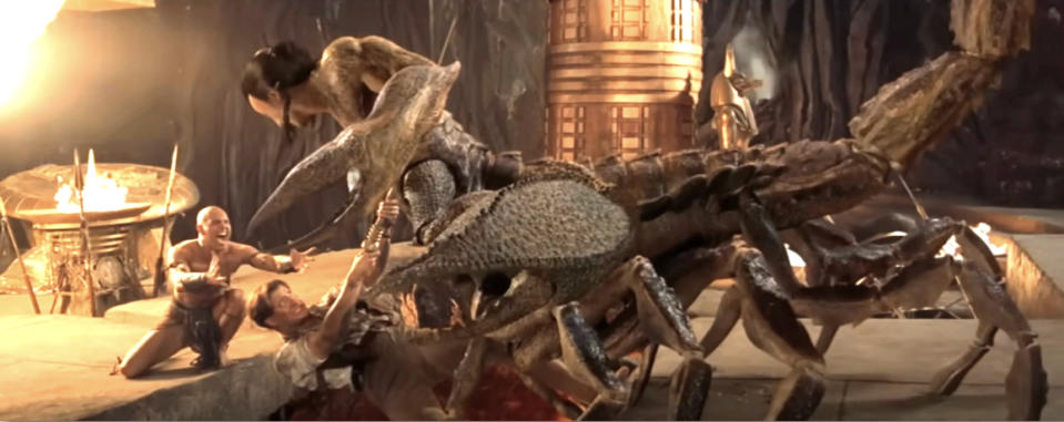 Dwayne Johnson as the Scorpion King battles Brendan Fraser's Rick O'Connell in an action scene from "The Mummy Returns."