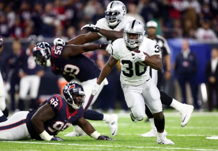 Oakland Raiders defensive back SaQwan Edwards (30) runs the ball during the fourth quarter of the AFC Wild Card playoff football game against the Houston Texans at NRG Stadium. Mandatory Credit: Troy Taormina-USA TODAY Sports