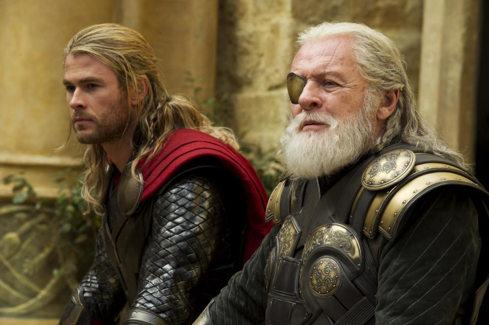 This publicity photo released by Walt Disney Studios and Marvel shows Chris Hemsworth, left, as Thor and Anthony Hopkins as Odin in Marvel's "Thor: The Dark World." (AP Photo/Walt Disney Studios/Marvel, Jay Maidment)