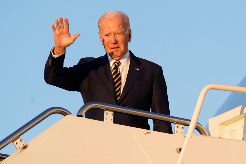 President Joe Biden waves as he boards Air Force One, Monday, Nov. 21, 2022, at Andrews Air Force Base, Md. Biden is traveling to Marine Corps Air Station Cherry Point in Havelock, N.C., to participate in Thanksgiving festivities with members of the military and their families. (AP Photo/Patrick Semansky) ORG XMIT: MDPS302
