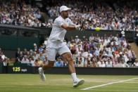 Britain Tennis - Wimbledon - All England Lawn Tennis & Croquet Club, Wimbledon, England - 4/7/16 USA's Steve Johnson in action against Switzerland's Roger Federer REUTERS/Andrew Couldridge