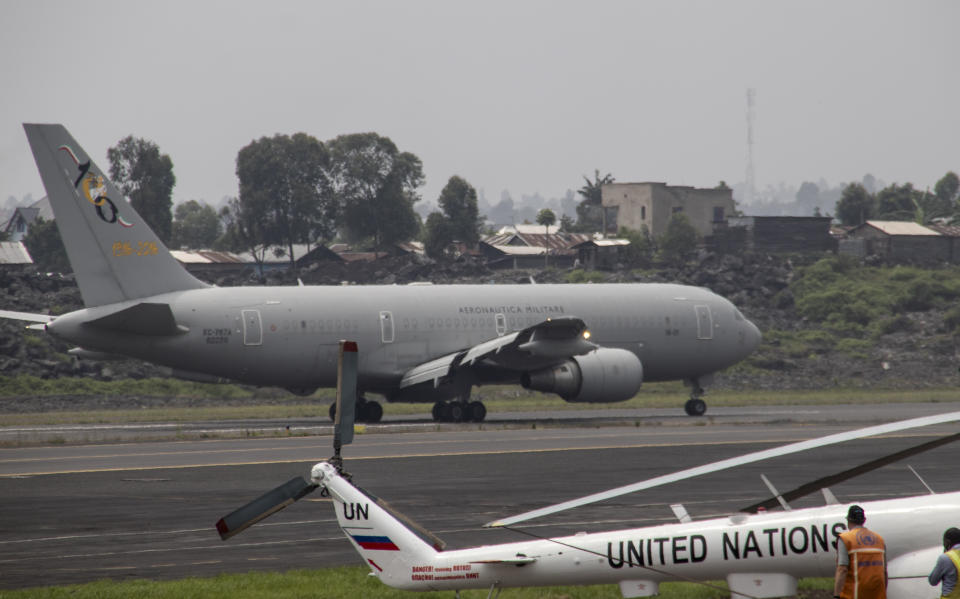 An airplane arrives to transport the bodies of Italian ambassador to Congo Luca Attanasio and Carabinieri officer Vittorio Iacovacci to the capital Kinshasa, at the airport in Goma, North Kivu province, Congo Tuesday, Feb. 23, 2021. Congo has dispatched a team to support investigators on the ground in Goma where the Italian ambassador to Congo, an Italian Carabinieri police officer and their driver were ambushed and killed Monday. (AP Photo/Justin Kabumba)