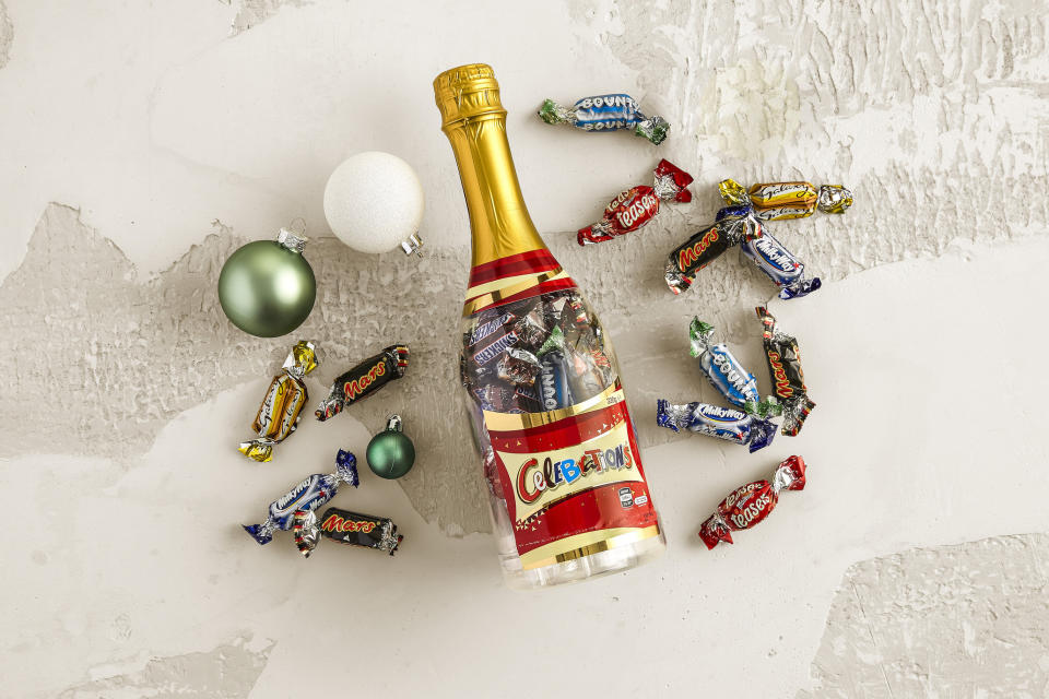 <p>Chocolates in a champagne bottle?! Now, this is truly something to celebrate. Source: <a rel="nofollow noopener" href="https://www.target.com.au/p/mars-celebrations-chocolate-variety-mix-candy-bars-in-a-champagne-bottle-32-g/61756397" target="_blank" data-ylk="slk:Target;elm:context_link;itc:0;sec:content-canvas" class="link ">Target</a> </p>
