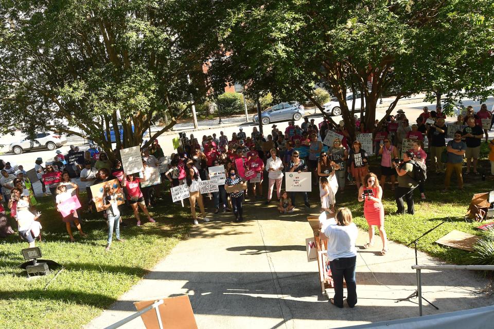 Lynn Shoemaker with WOW speaks in front of hundreds at Innes Park near Thalian Hall in downtown Wilmington, N.C. June 24, 2022. Protesters gathered following the U.S. Supreme Court’s Friday morning decision that overturned Roe v. Wade and eliminated the constitutional right to an abortion for Americans.  KEN BLEVINS/STARNEWS