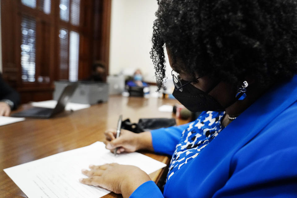 Georgia gubernatorial Democratic candidate Stacey Abrams qualifies for the 2022 election on Tuesday, March 8, 2022, in Atlanta. Abrams has no announced opposition for governor for the Democratic nomination. (AP Photo/Brynn Anderson)