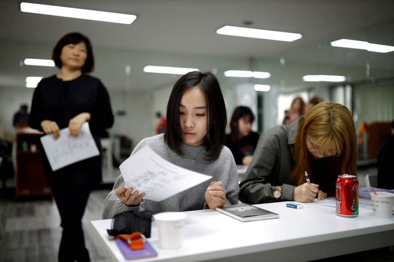 FILE PHOTO: Japanese youth attend language class in Seoul, South Korea