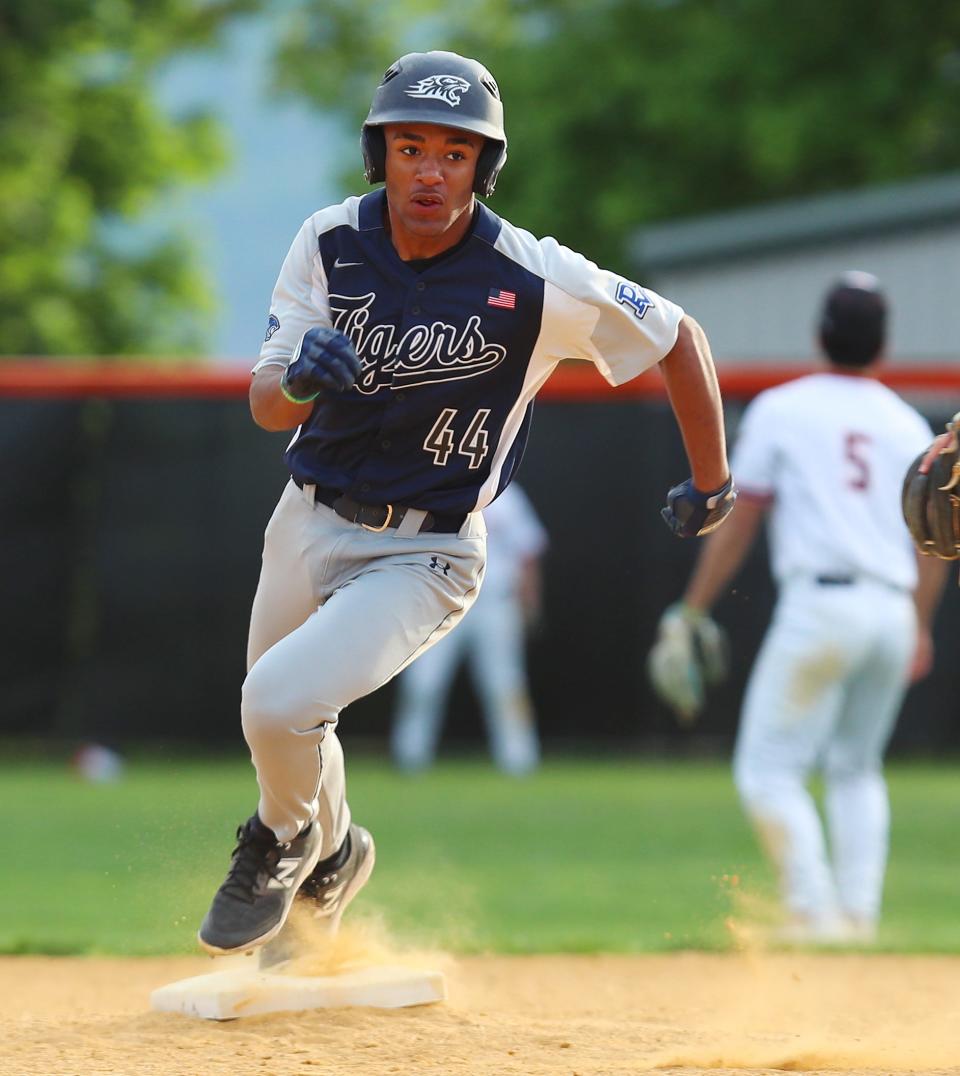 Putnam Valley's Aaron Pierre (44) rounds second base on an rbi triple against Croton during baseball action at Croton-Harmon High School May 3, 2024. Putnam Valley won the game 5-1.