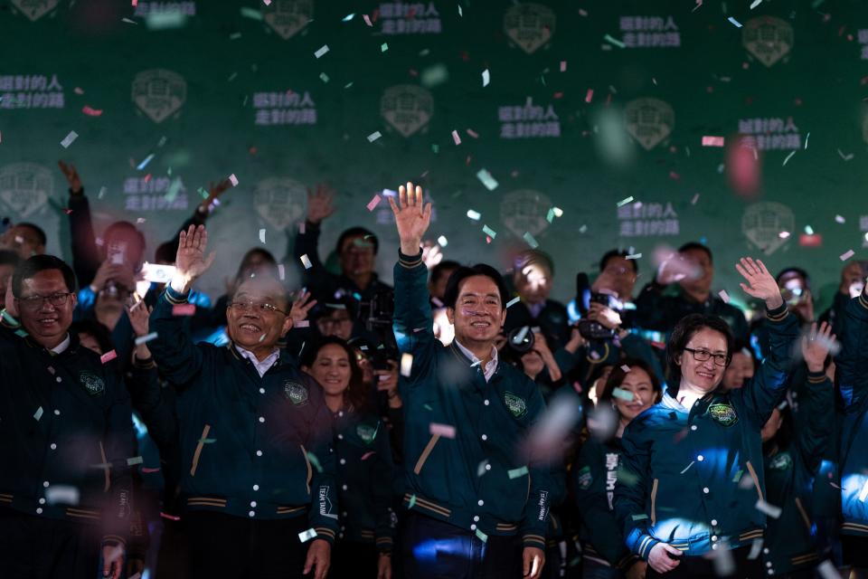 Democratic Progressive Party candidate Lai Ching-te, with Bi-khim Hsiao by his side, celebrates with supporters in New Taipei City, Taiwan, Saturday, Jan. 13, 2024. The Ruling-party candidate emerged victorious in Taiwan's presidential election on Saturday and his opponents conceded, a result that will chart the trajectory of the self-ruled democracy's relations with China over the next four years.(AP Photo/Louise Delmotte) ORG XMIT: XYA132