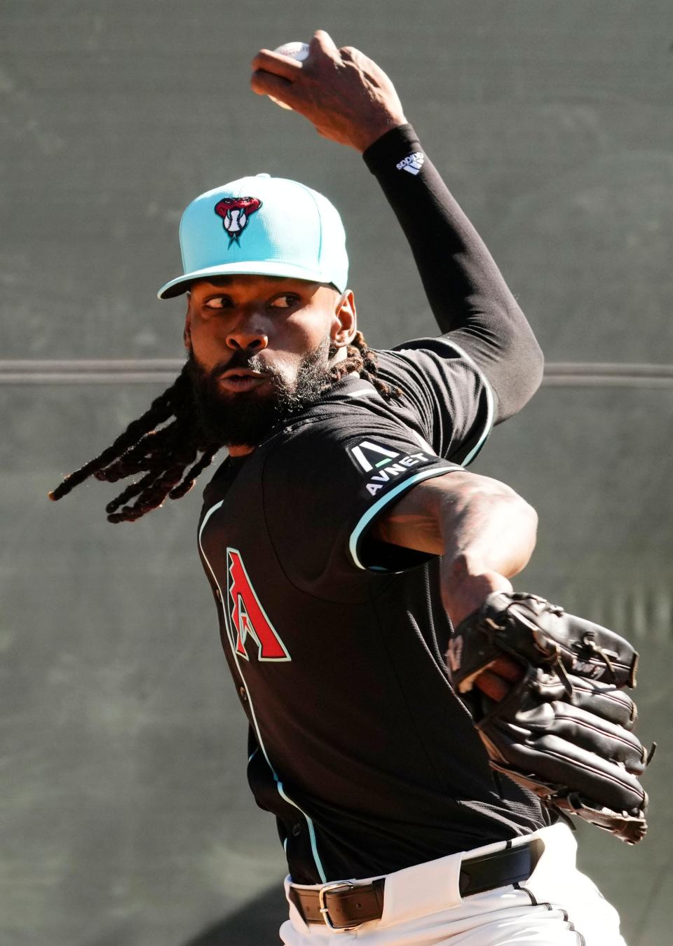 Arizona Diamondbacks pitcher Miguel Castro throws in the bullpen during spring training workouts at Salt River Fields at Talking Stick in Scottsdale on Feb. 15, 2024.