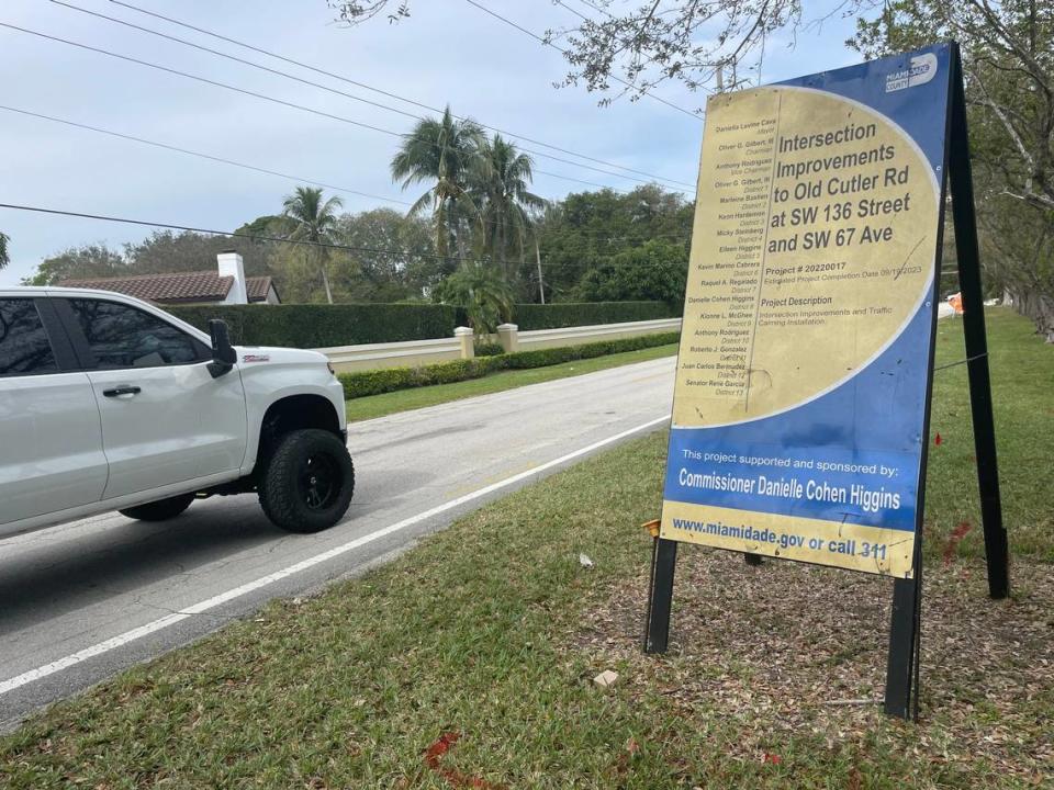 A sign promoting a future traffic circle planned by Miami-Dade County at the intersection of Old Cutler Road and Southwest 67th Avenue. Nearby residents are suing the county to block the roundabout.
